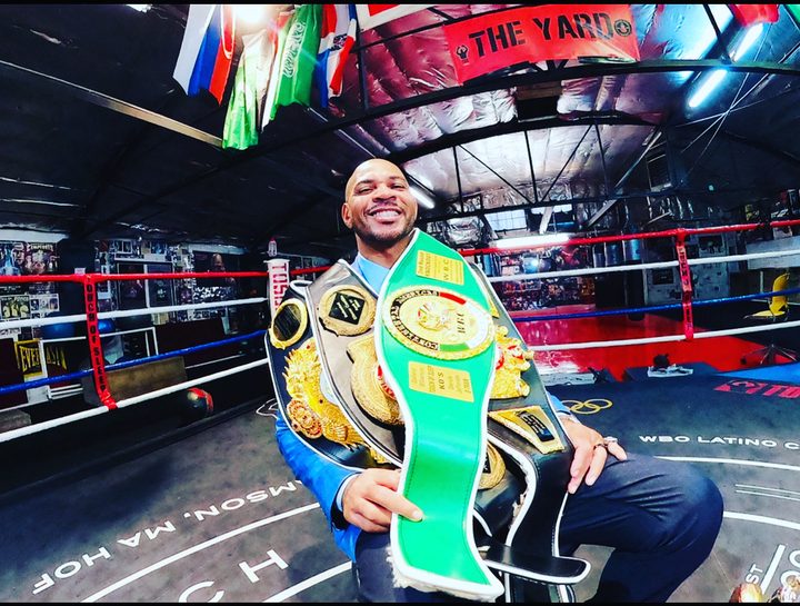 DaVarryl with championship belts in The Yard ring